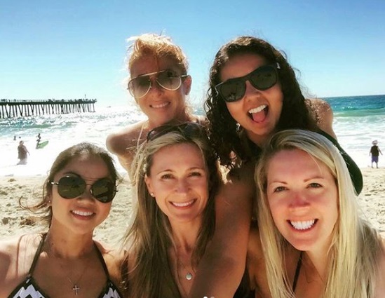 Agnes Wilczynski with her friends at Hermosa Beach, California enjoying a v...