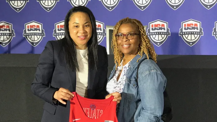 Dawn Staley (left) with her sister Tracey (right) when she was named the head coach of the women’s national team in 2017. Dawn Staley