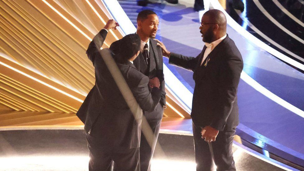 Smith with Denzel Washington and Tyler Perry after the incident